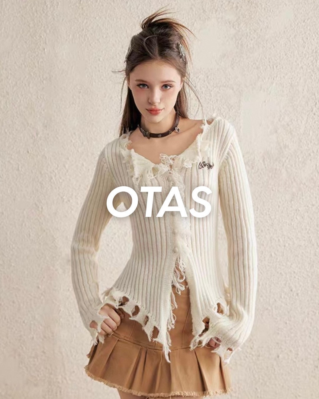 damage cardigan