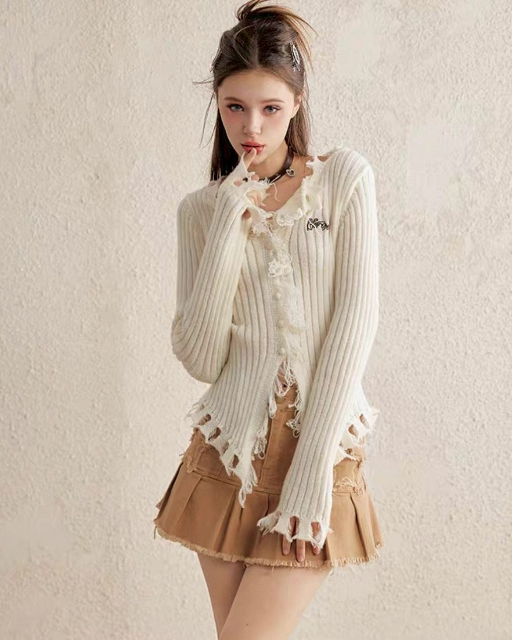 damage cardigan