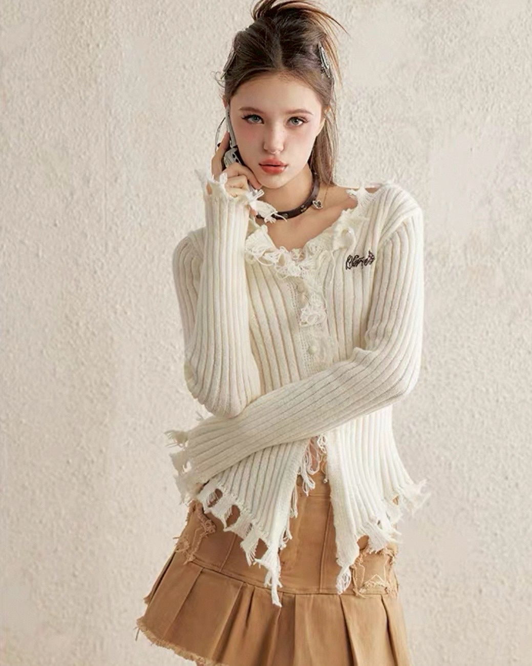 damage cardigan